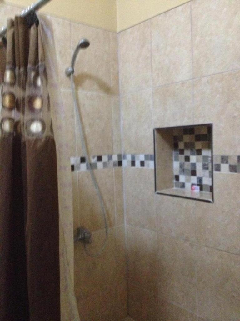 Banyan Rose Apartment Orange Walk Town ภายนอก รูปภาพ